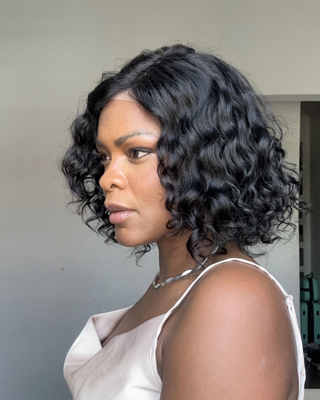 Perruque à fermeture en dentelle 5x5 avec boucles ondulées